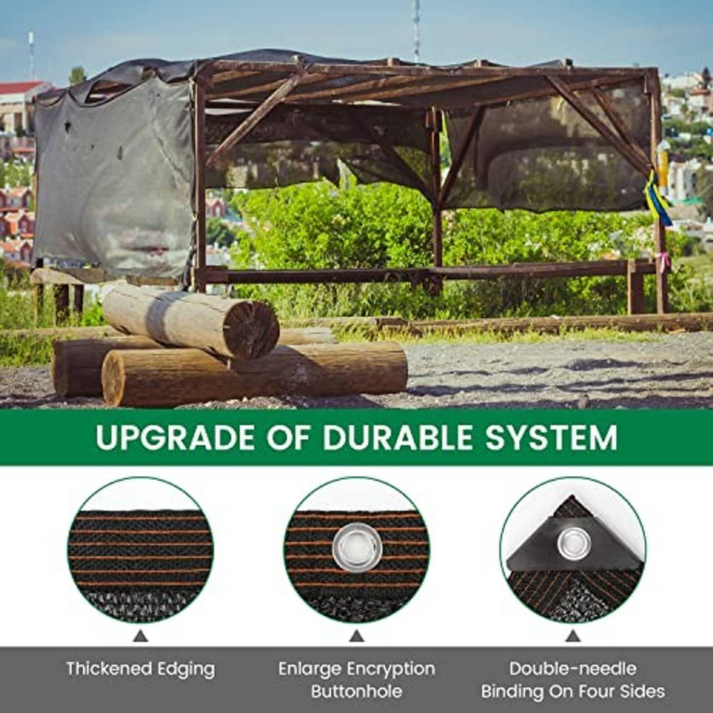 Outdoor sun shade cloth draped over a frame, dark charcoal with rust-brown trim