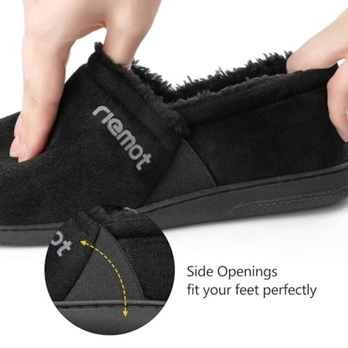Black moccasin slippers close-up with side opening and fuzzy lining detail.