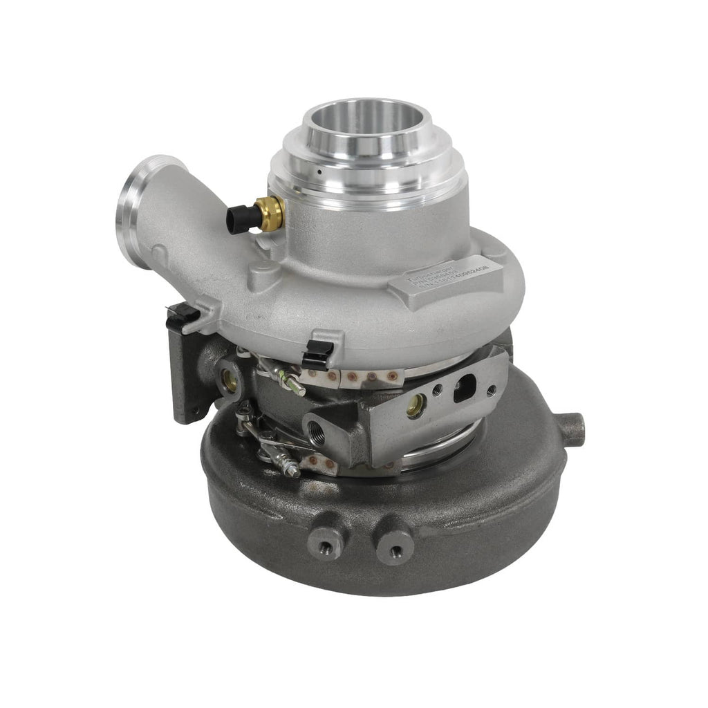 Turbocharger assembly shown from side with silver housing and dark base