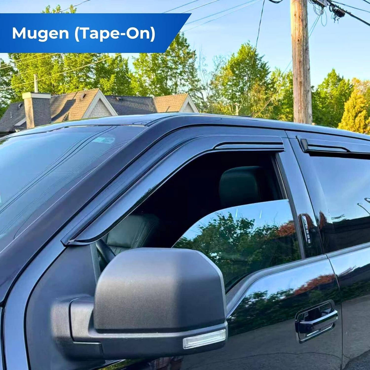 Glossy black window visor rain guard installed on a car side window