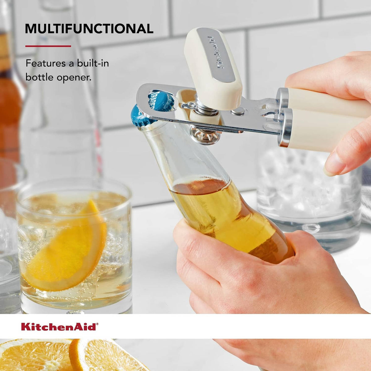 Multifunction can opener with built-in bottle opener over a glass bottle