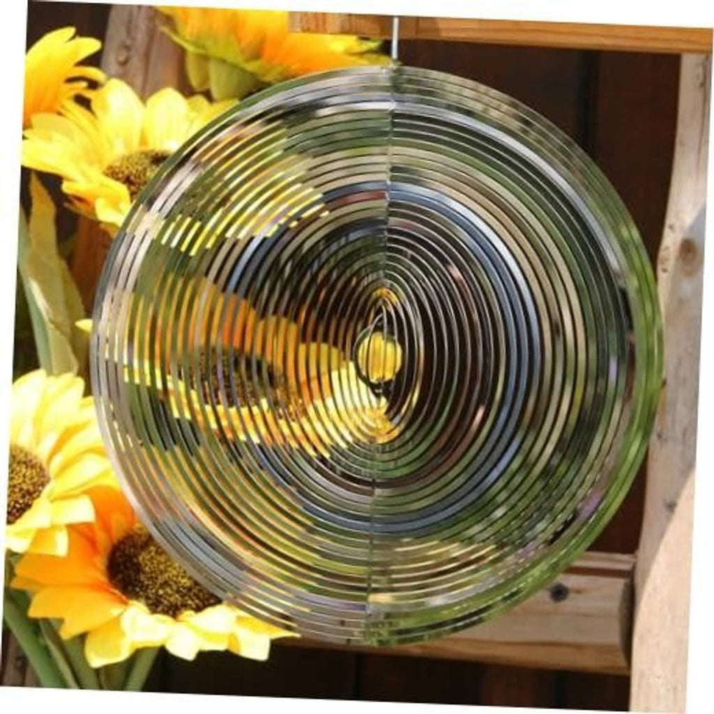Silver round wind spinner with concentric metal rings and central hanging bead