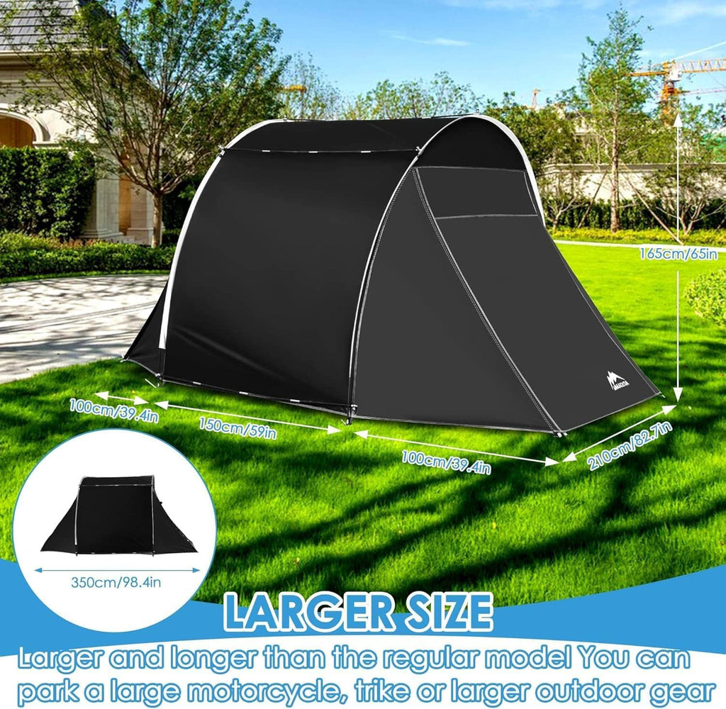 Portable bike storage tent, black and gray, open doorway on grass with tent stakes