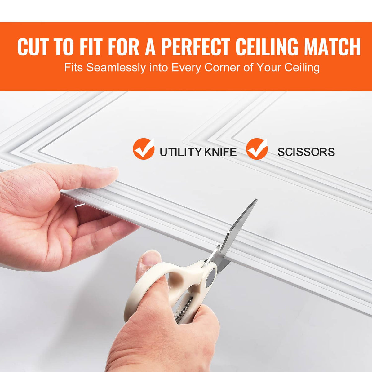 White PVC ceiling tile edge being trimmed; square geometric frame relief pattern