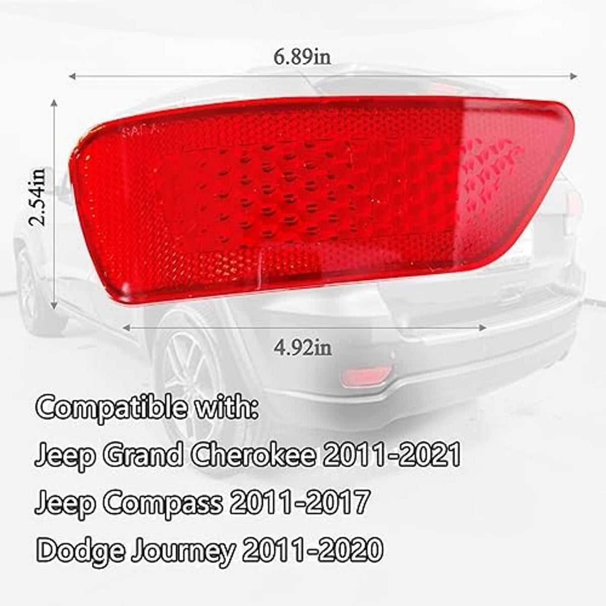 Red rear bumper trim reflector lens with honeycomb texture, wide triangular