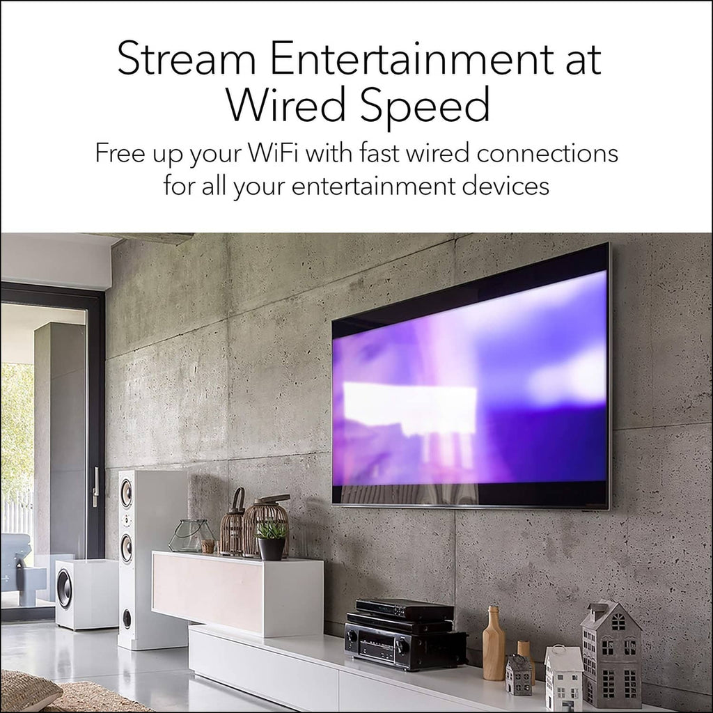 Wired entertainment setup in a living room; network switch not clearly visible