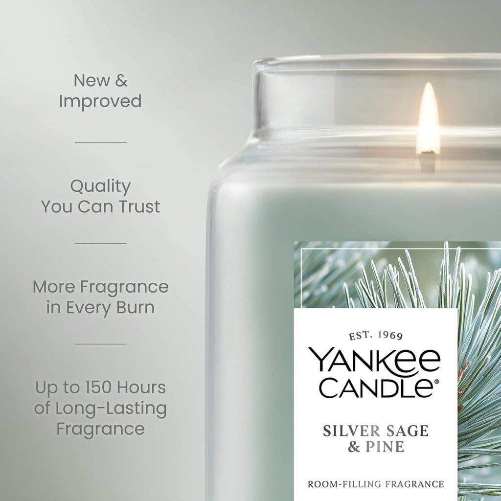 Lit large glass jar candle with Silver Sage & Pine label