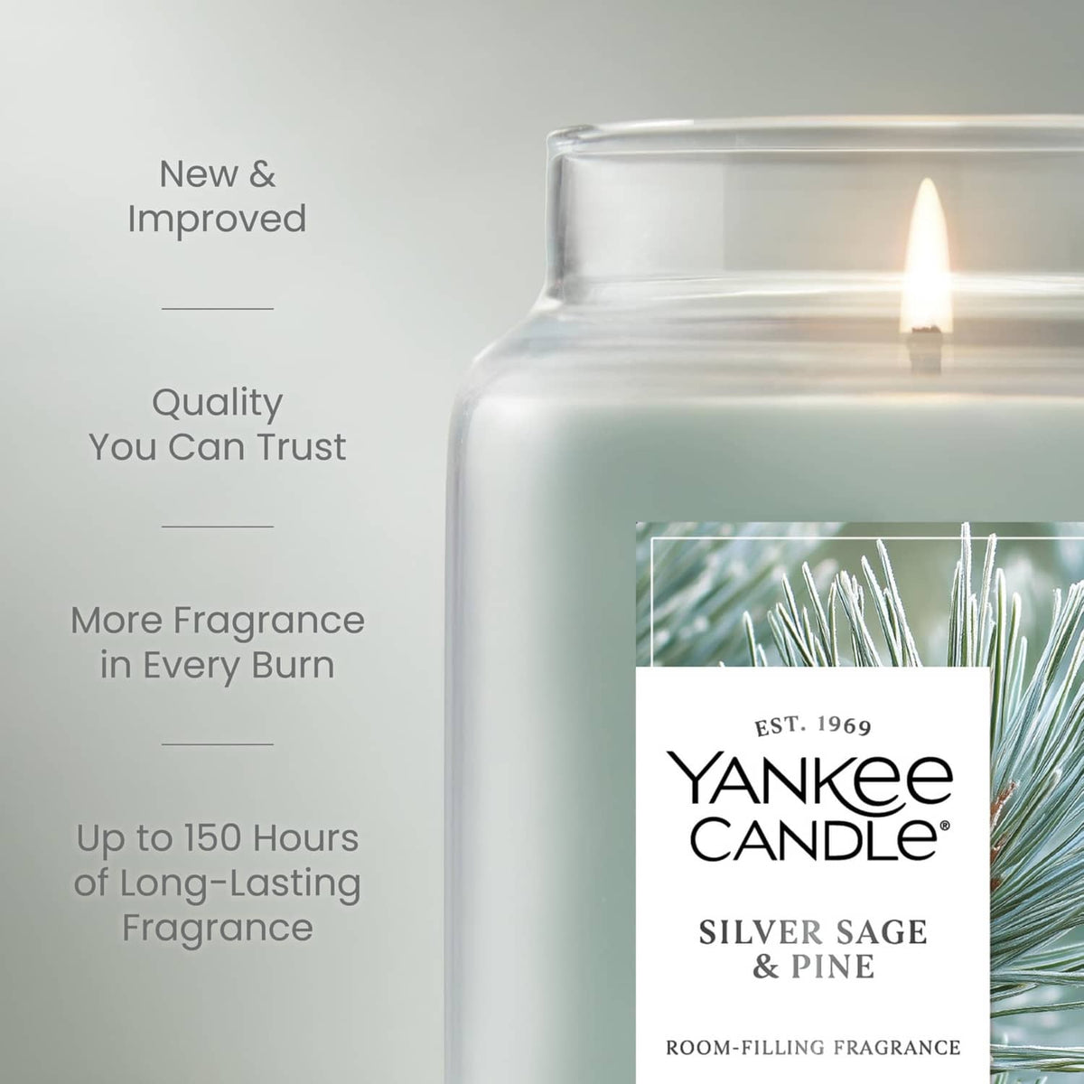 Lit large glass jar candle with Silver Sage & Pine label