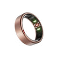 Matte rose gold titanium smart ring with black sensor display on a curved top edge