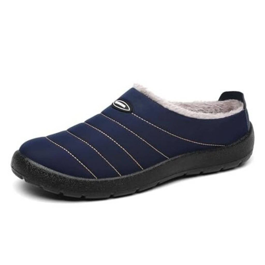 Dark blue slip-on house slippers with white faux-fur lining and stitched stripe panels