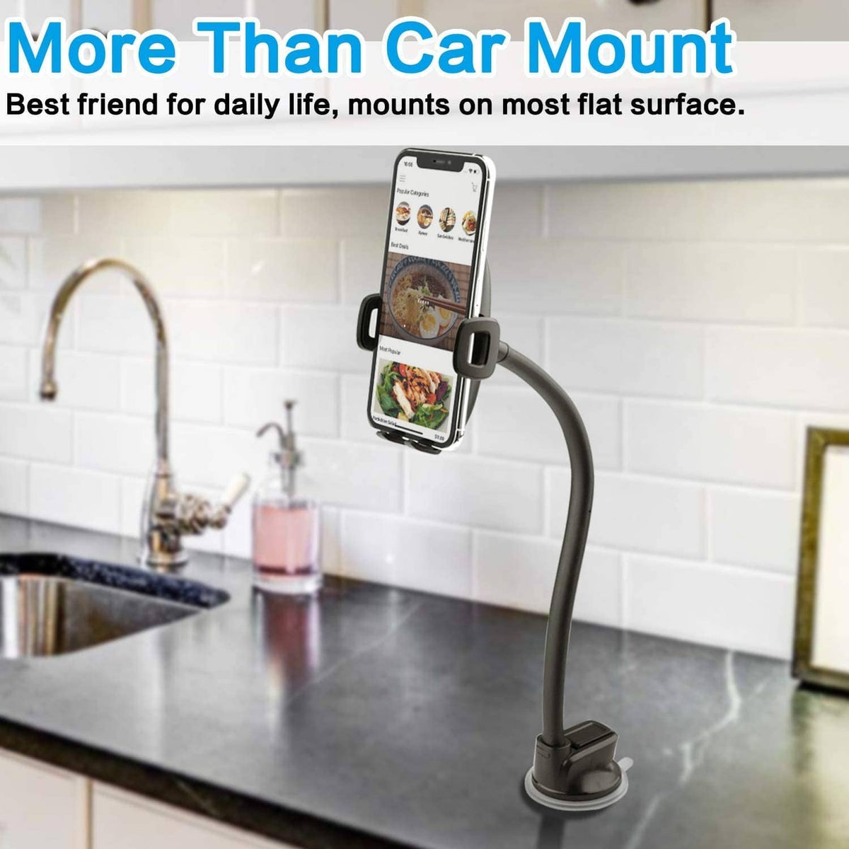 Suction-based phone mount with black clamp and curved arm holding a smartphone