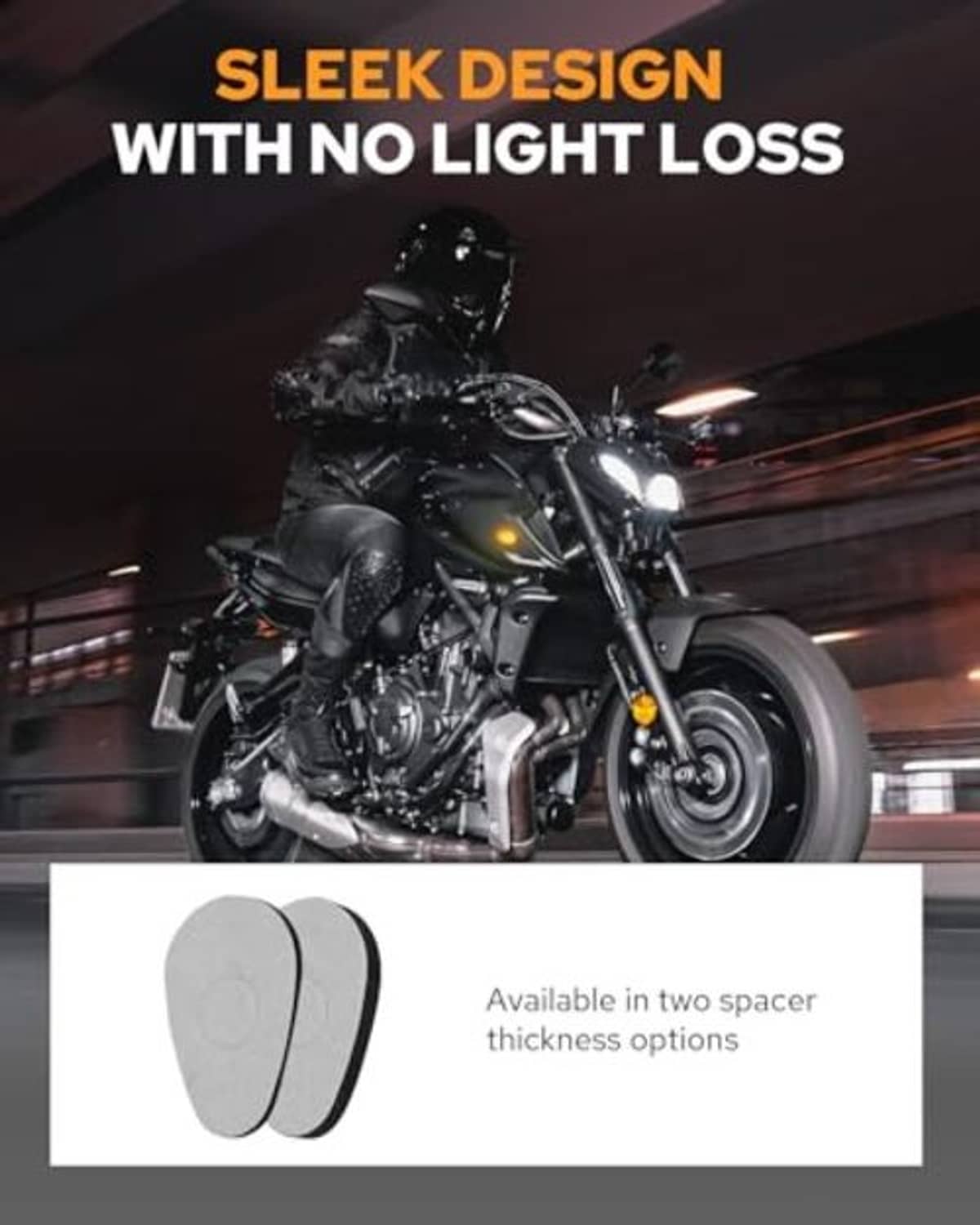 Smoked oval amber LED turn signal mounted on a motorcycle front with spacer options