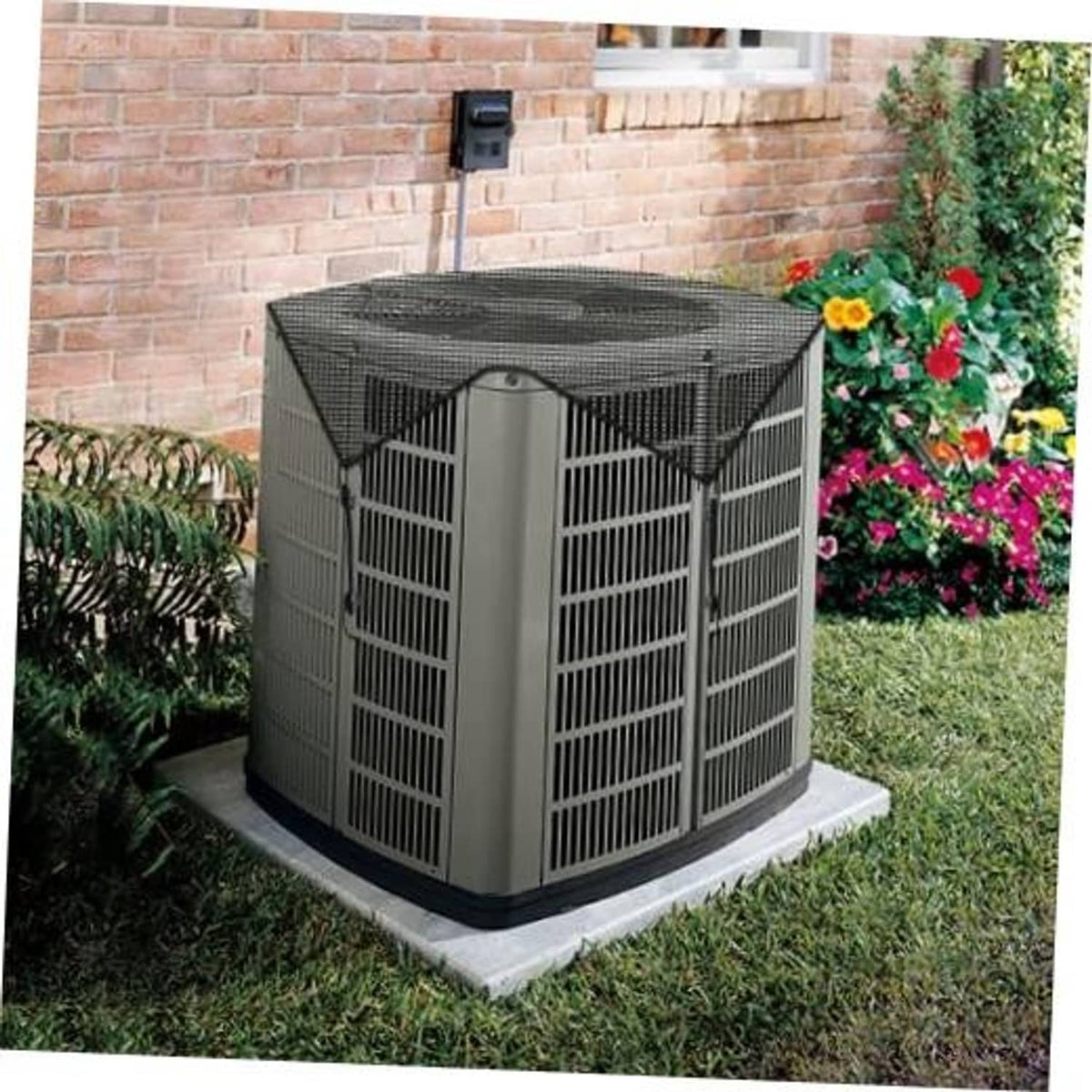 Outdoor air conditioner cover with dark mesh panels over a square outdoor unit