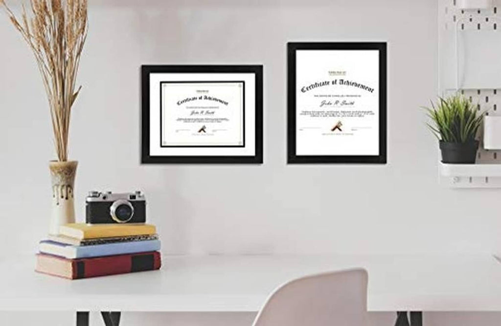 Two black document frames with white mats holding certificates