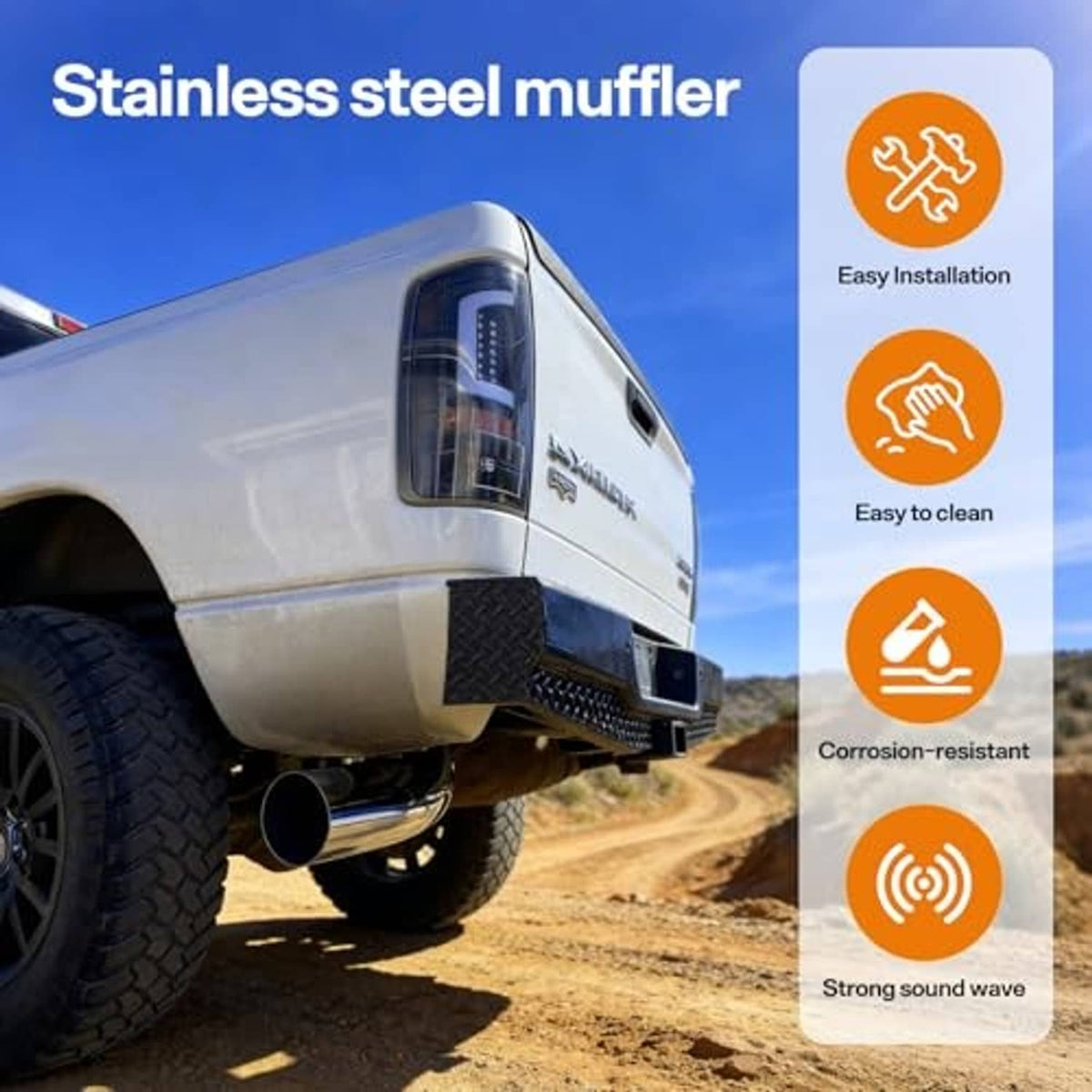 Stainless silver tailpipe outlet and muffler area installed on a pickup, black exhaust opening