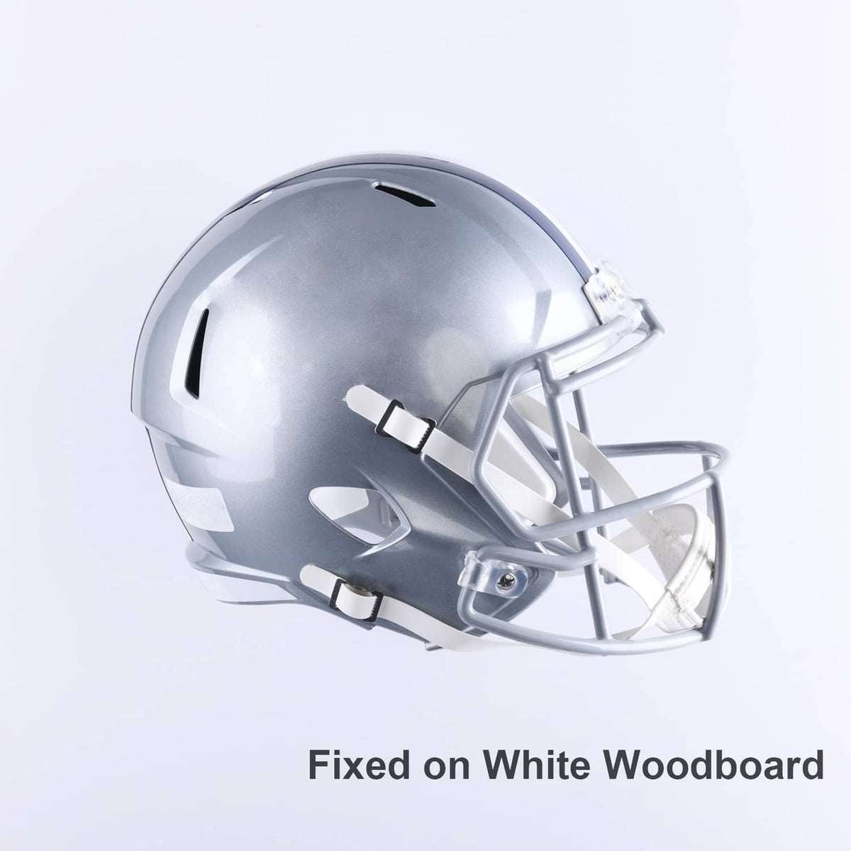 Silver football helmet mounted on a wall display hanger with metal face guard