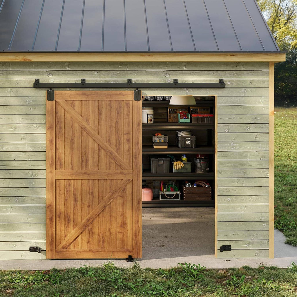 Barn door track kit installed on outdoor shed with wooden sliding door