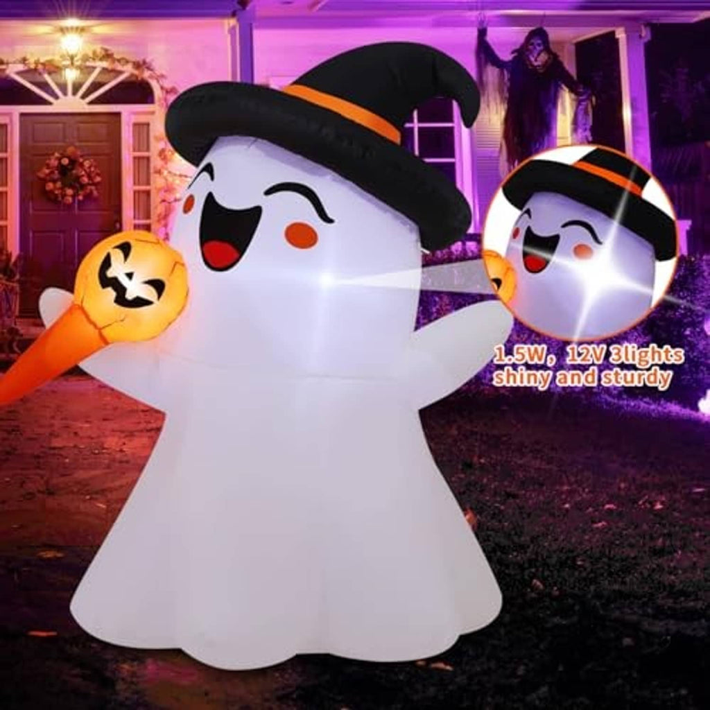 White inflatable ghost with black witch hat and orange jack-o-lantern, front view outdoors