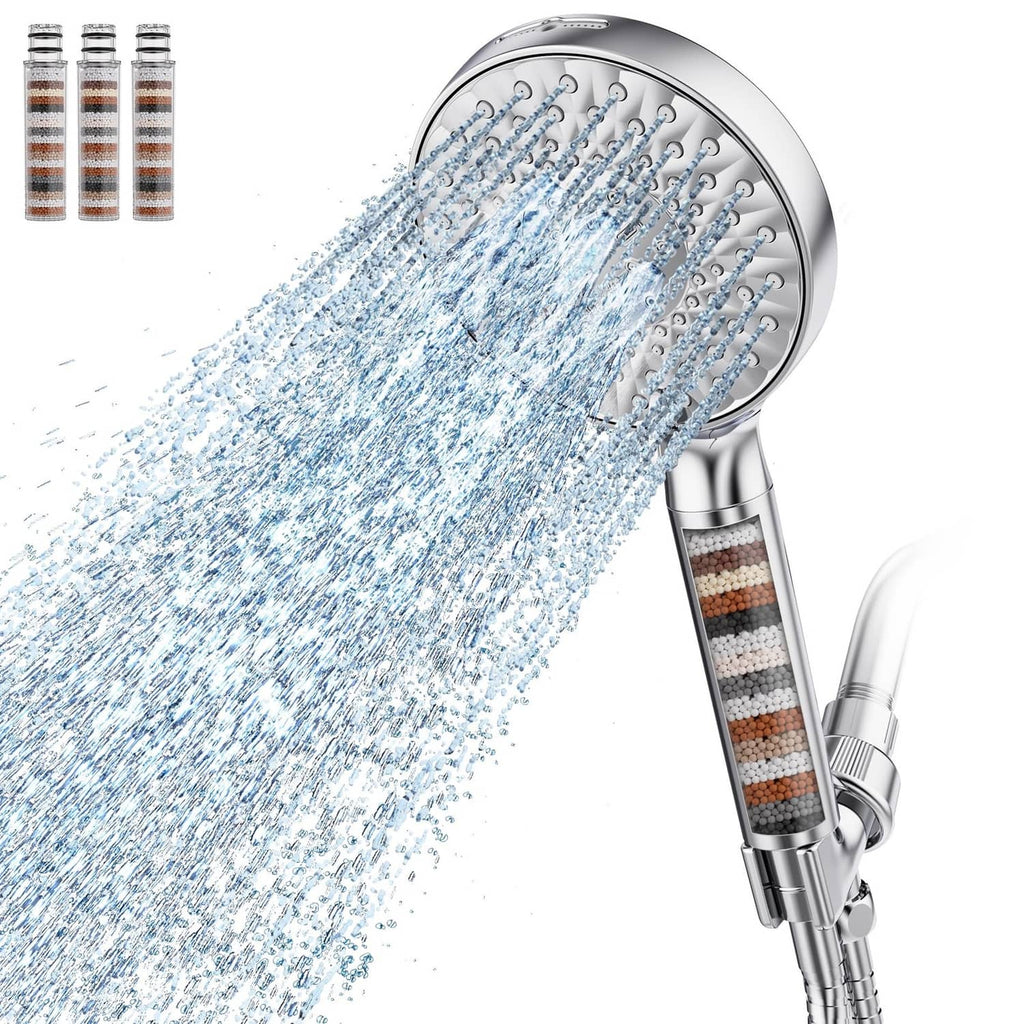 Chrome handheld filtered shower head with water spray and visible filter cartridge