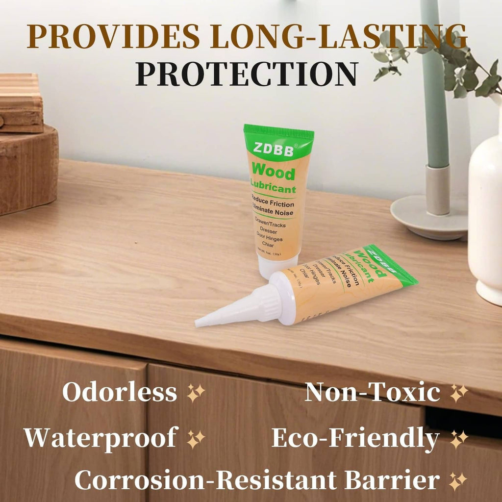Wood lubricant paste tube with cone applicator beside drawer tracks on a wooden surface