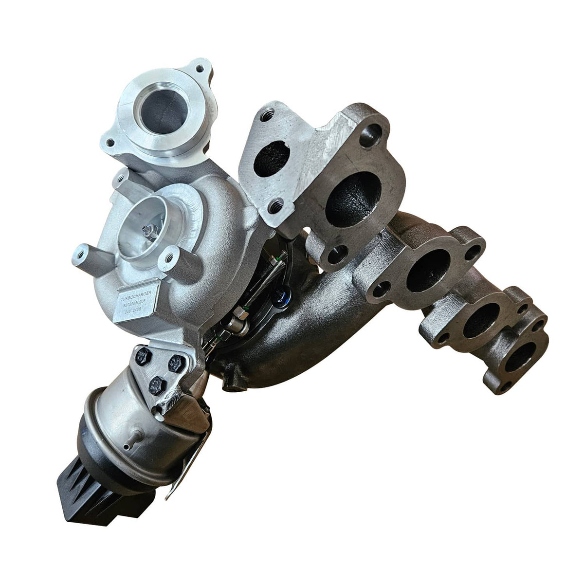 Turbocharger assembly, silver housings with black exhaust openings, angled view