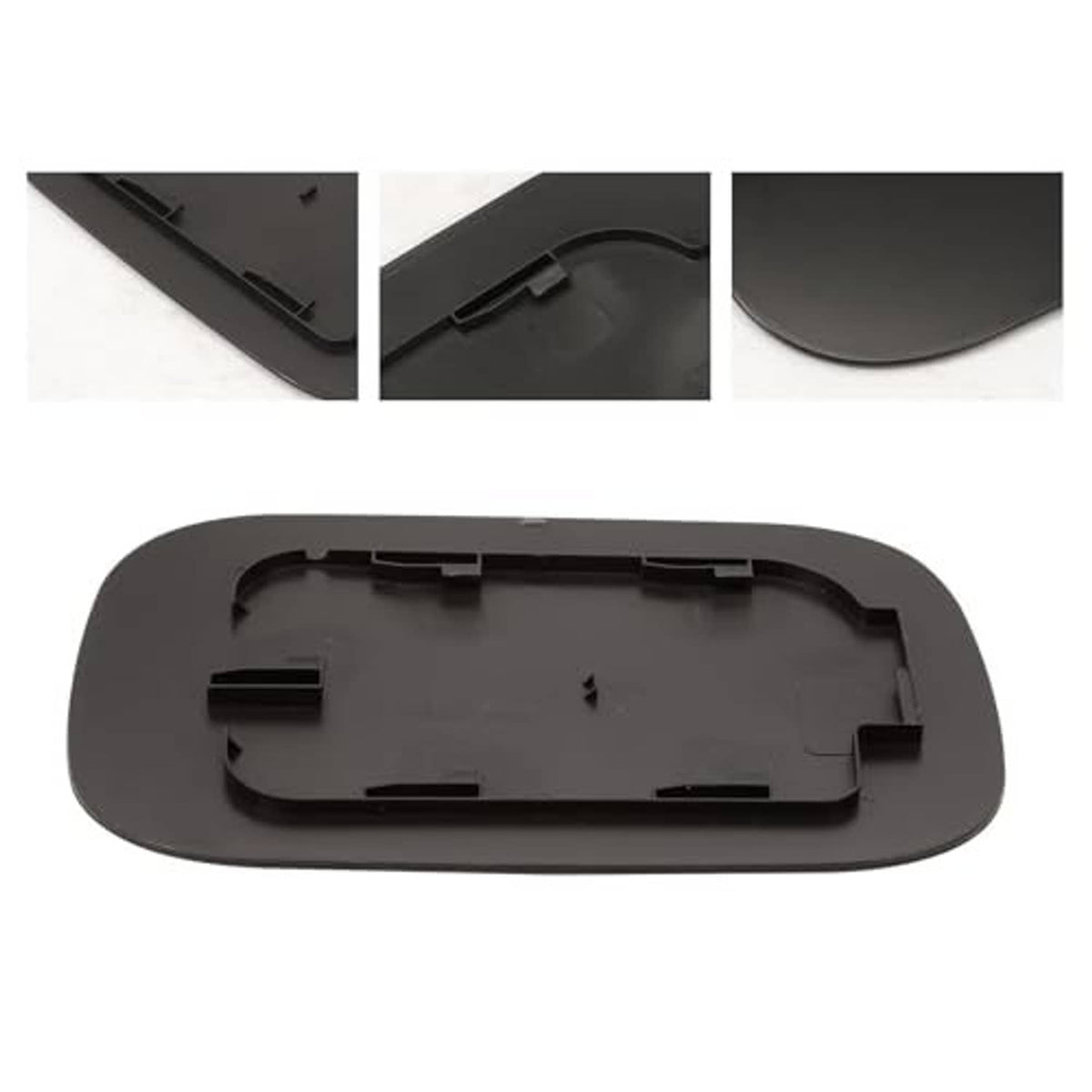 Black fuel tank filler door underside detail with mounting slots and tabs