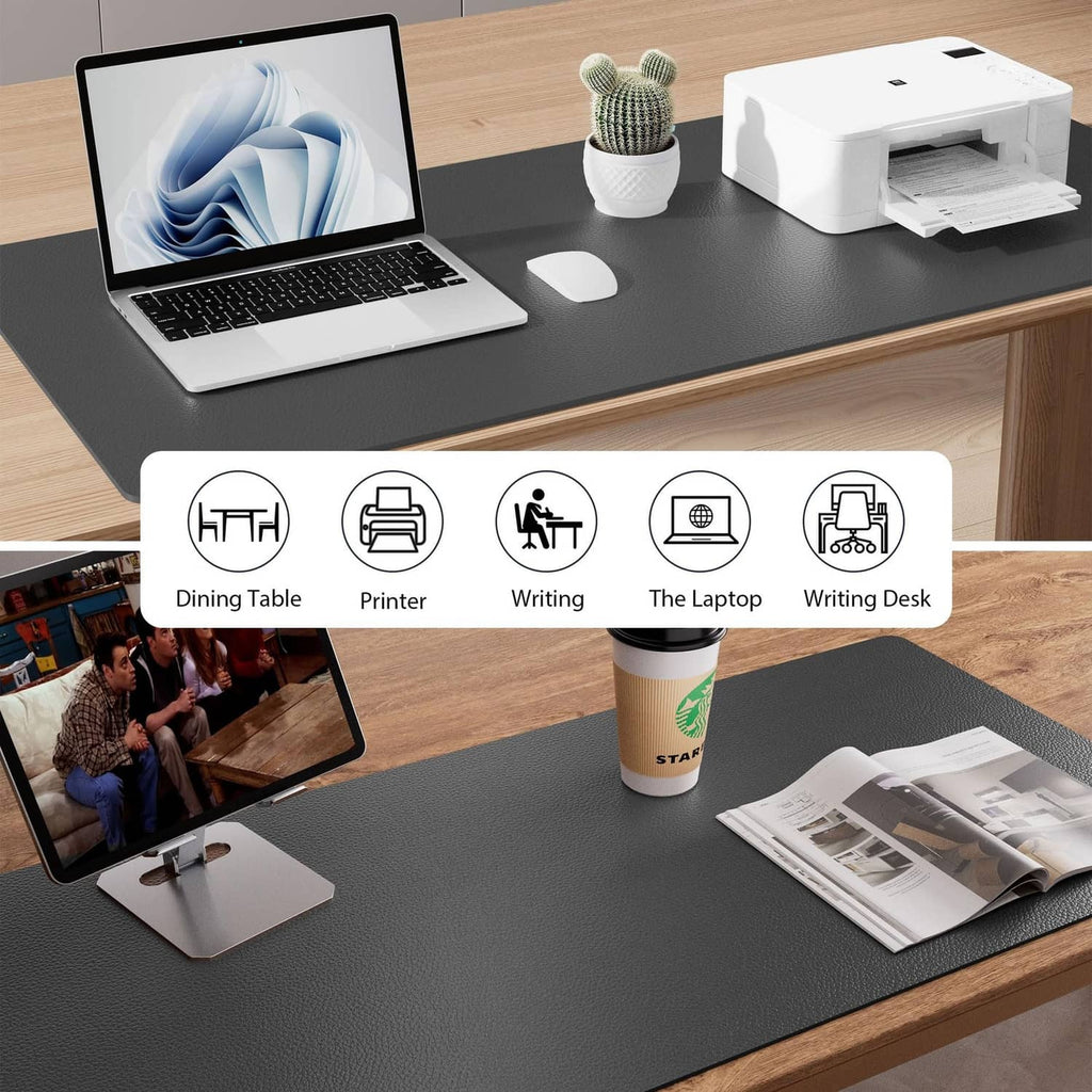 Gray desk pad protector on desk with laptop, mouse, and documents for work
