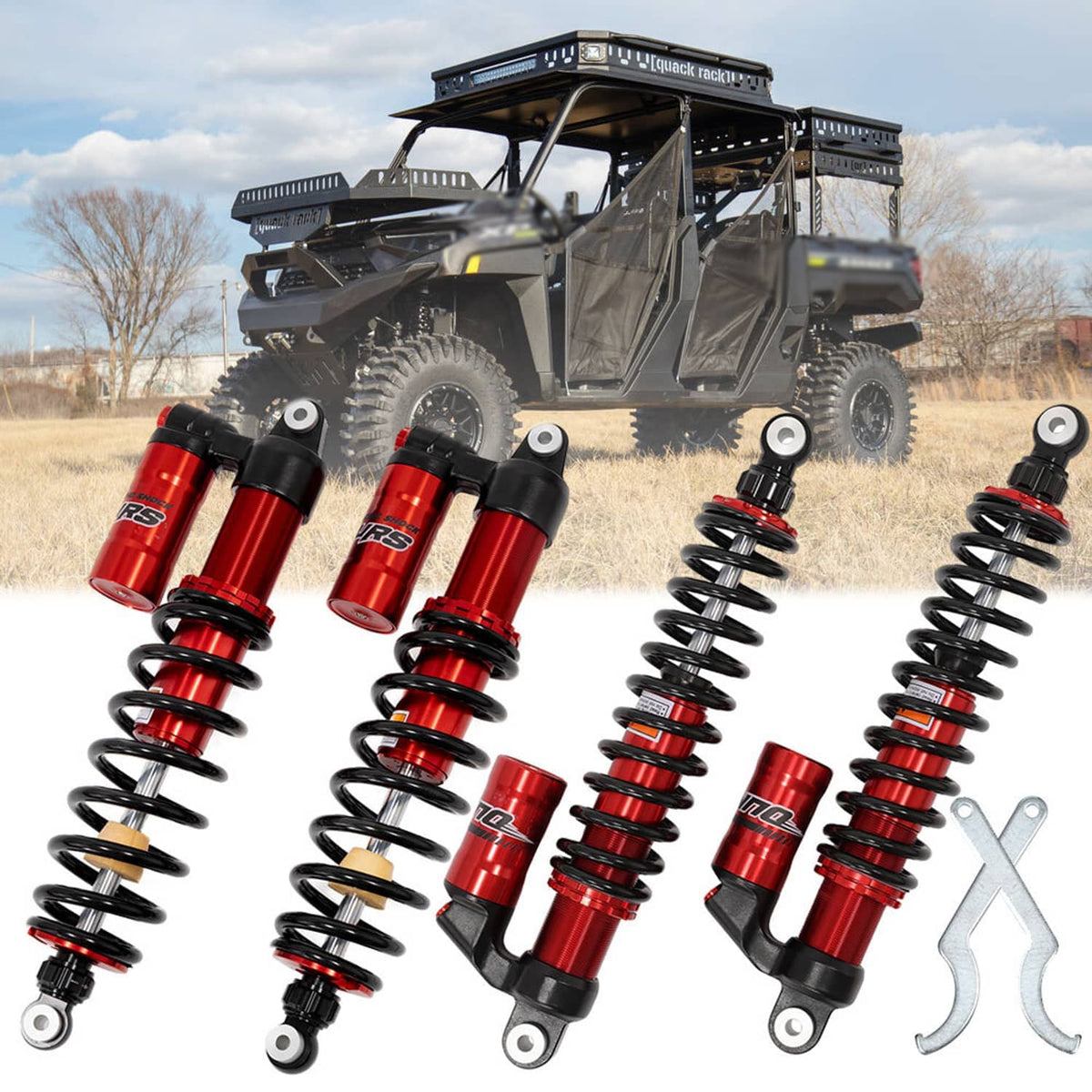 Four red shock absorbers with black coil springs and metal lower eye mounts