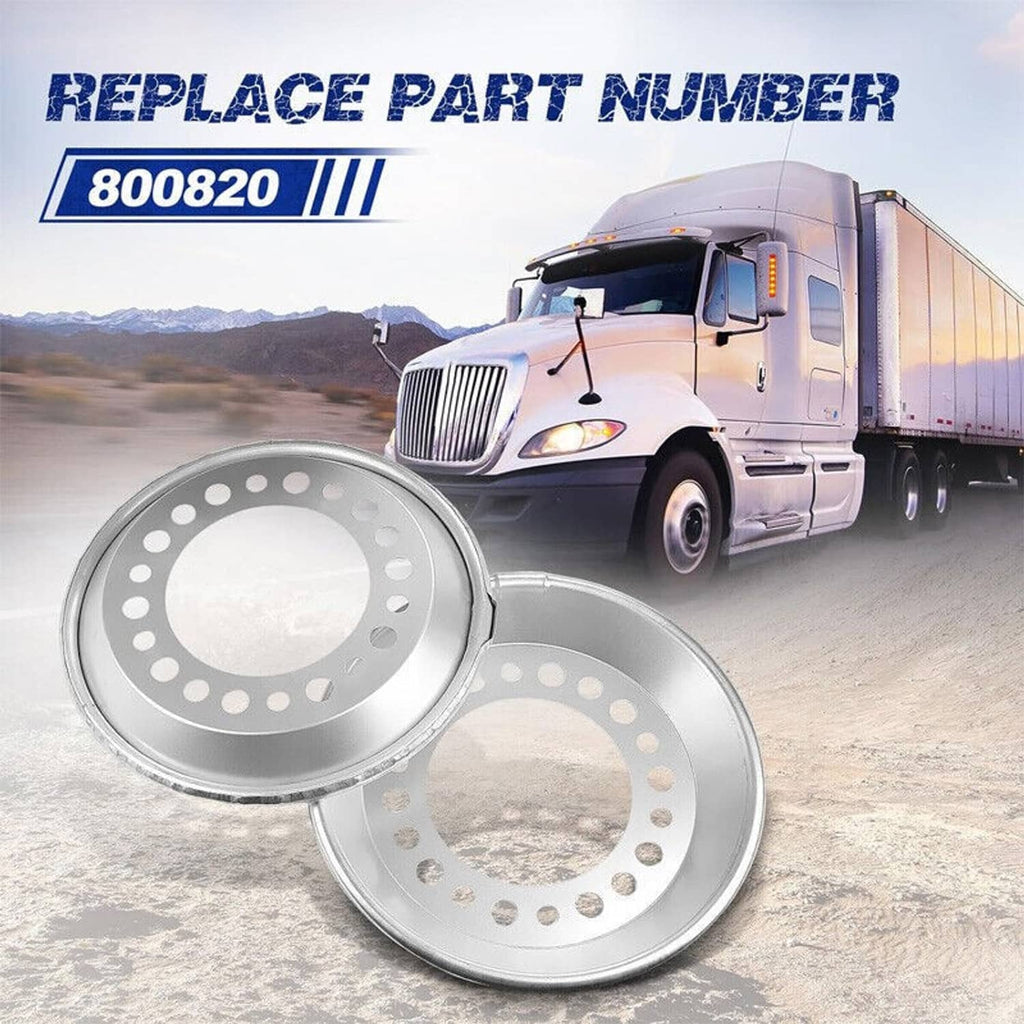 Two silver wheel balancer discs with circular perforations and central opening