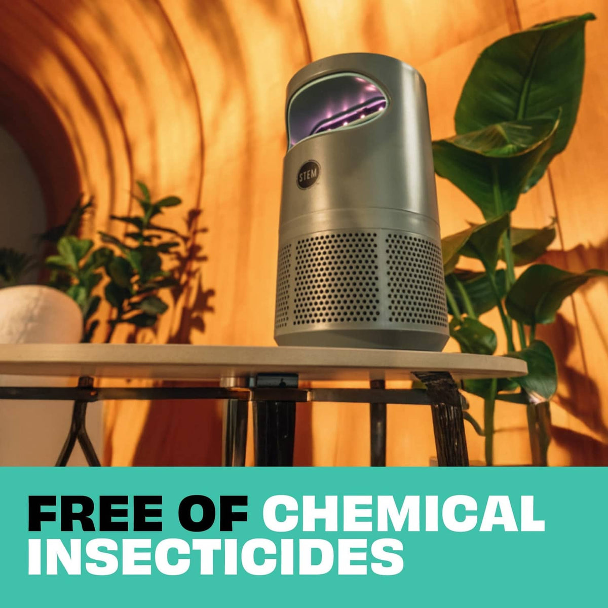 Flying insect fan trap device on shelf near indoor plants