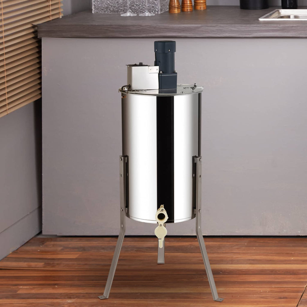 Stainless steel electric honey extractor on tripod legs with honey gate
