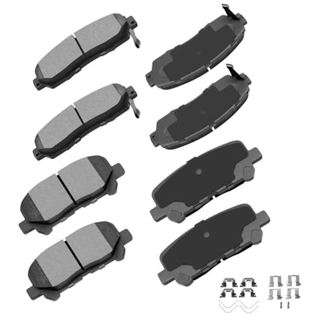 Brake pad set with grey ceramic friction pads and dark backing plates, multiple pieces