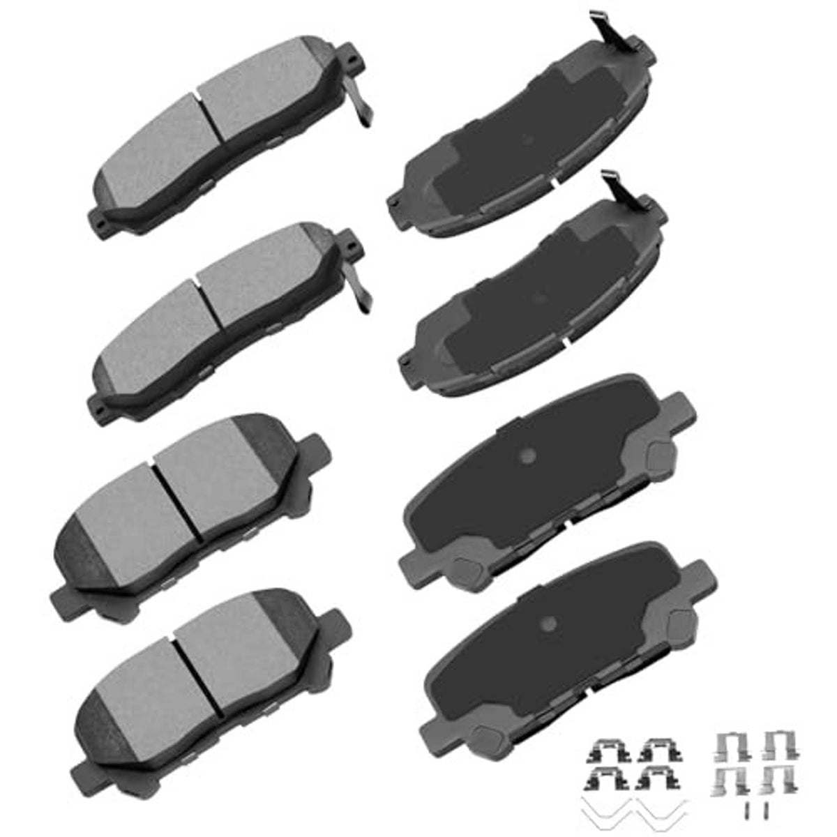 Brake pad set with grey ceramic friction pads and dark backing plates, multiple pieces