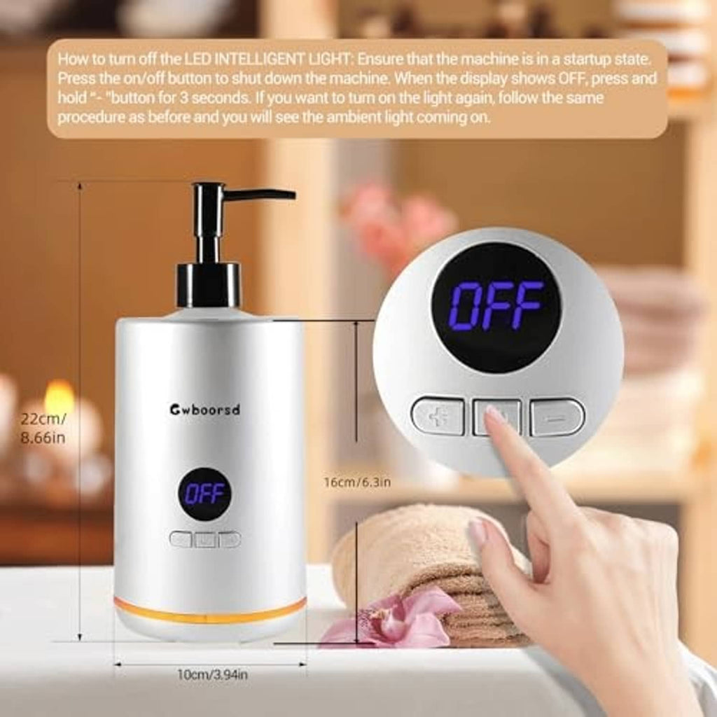 Oil warmer with OFF display and hand touching heating tray near towel