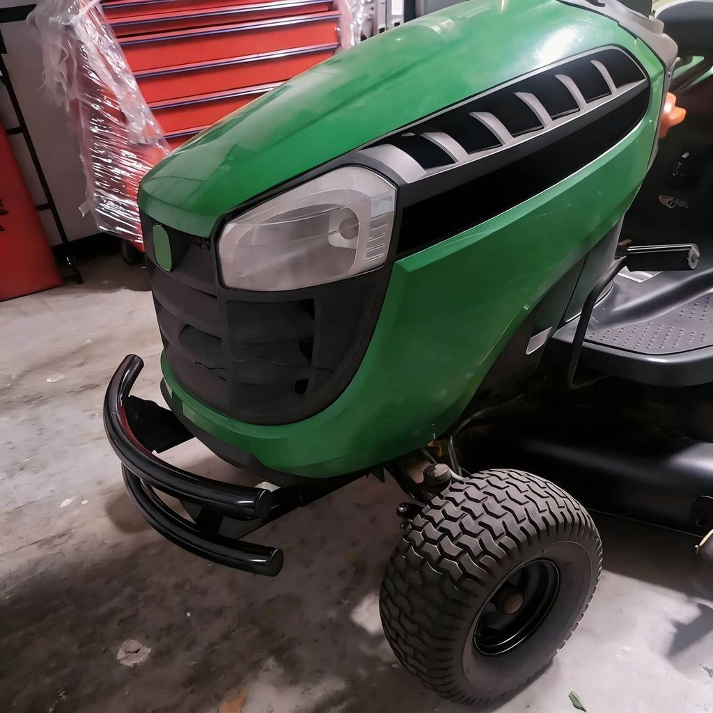 Installed black front bumper guard on a green lawn tractor
