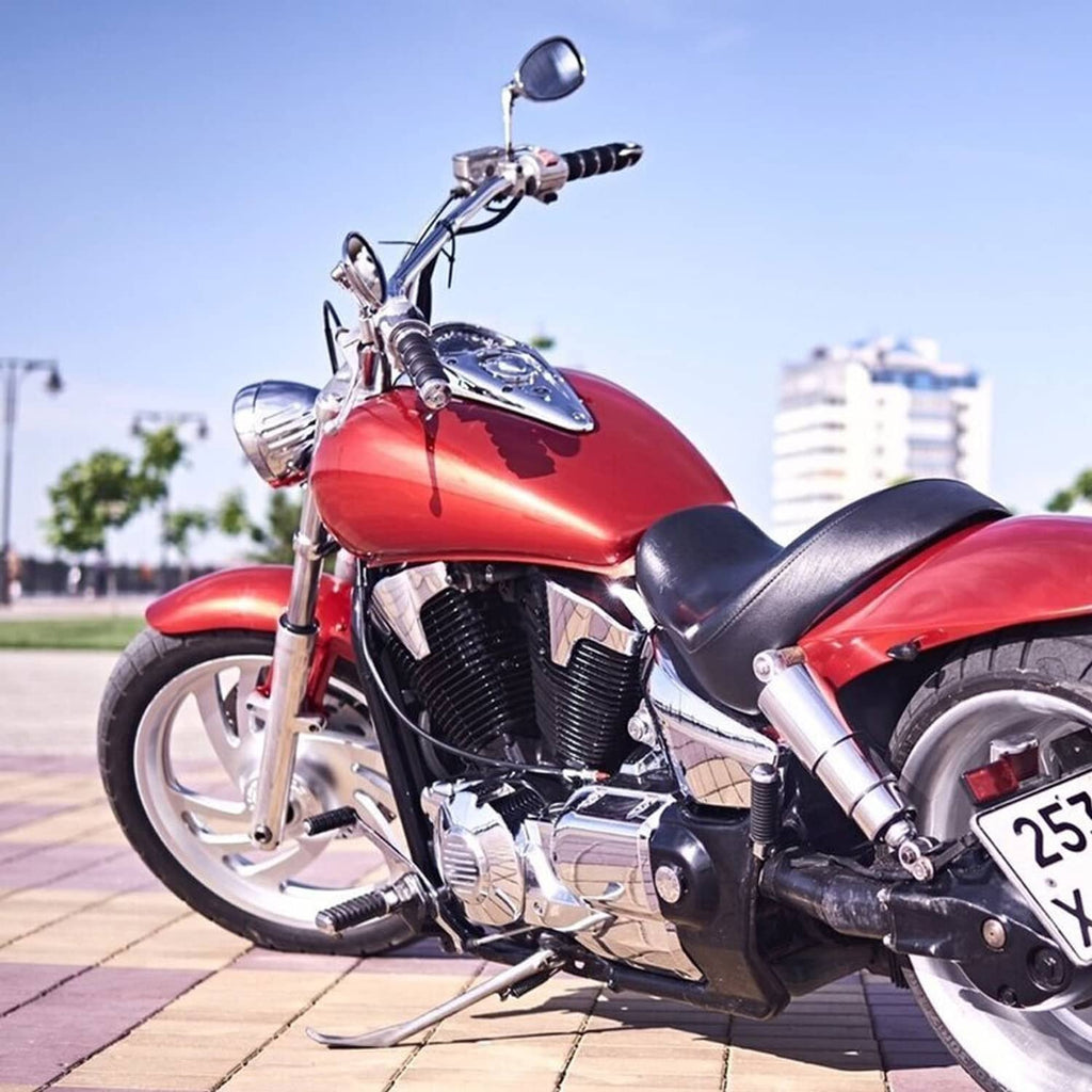 Chrome oval motorcycle mirror with reflective dark glass on long stem