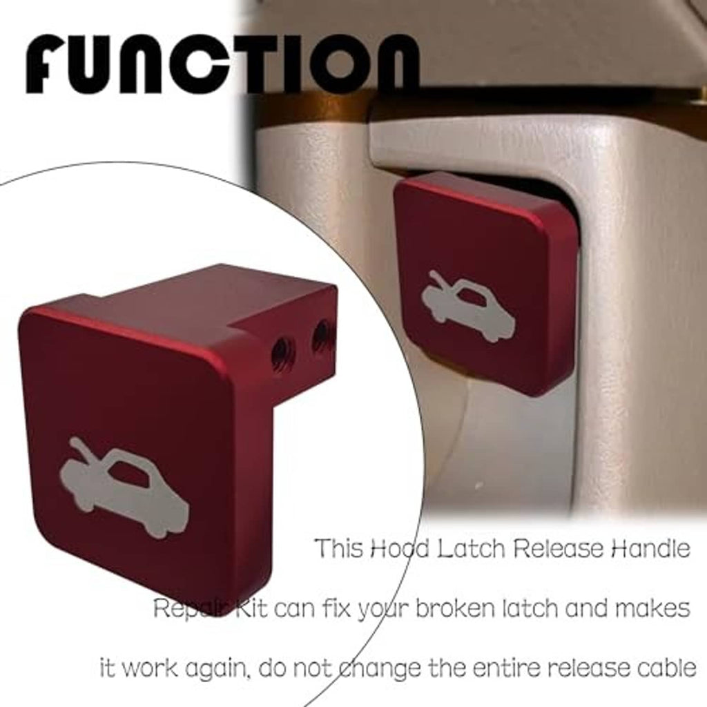 Red hood latch release handle mounted on gray dashboard panel