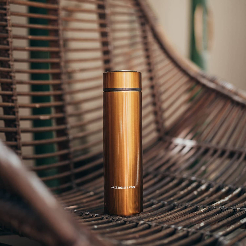 Gold insulin travel case cooler on a black hammock seat