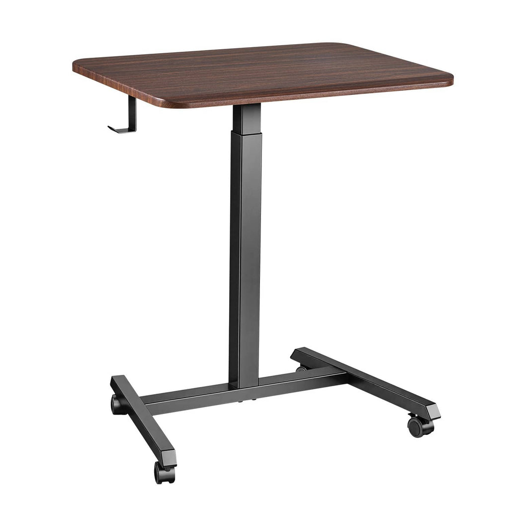 Standing desk with dark wood tabletop, tall metal column, and wheeled base