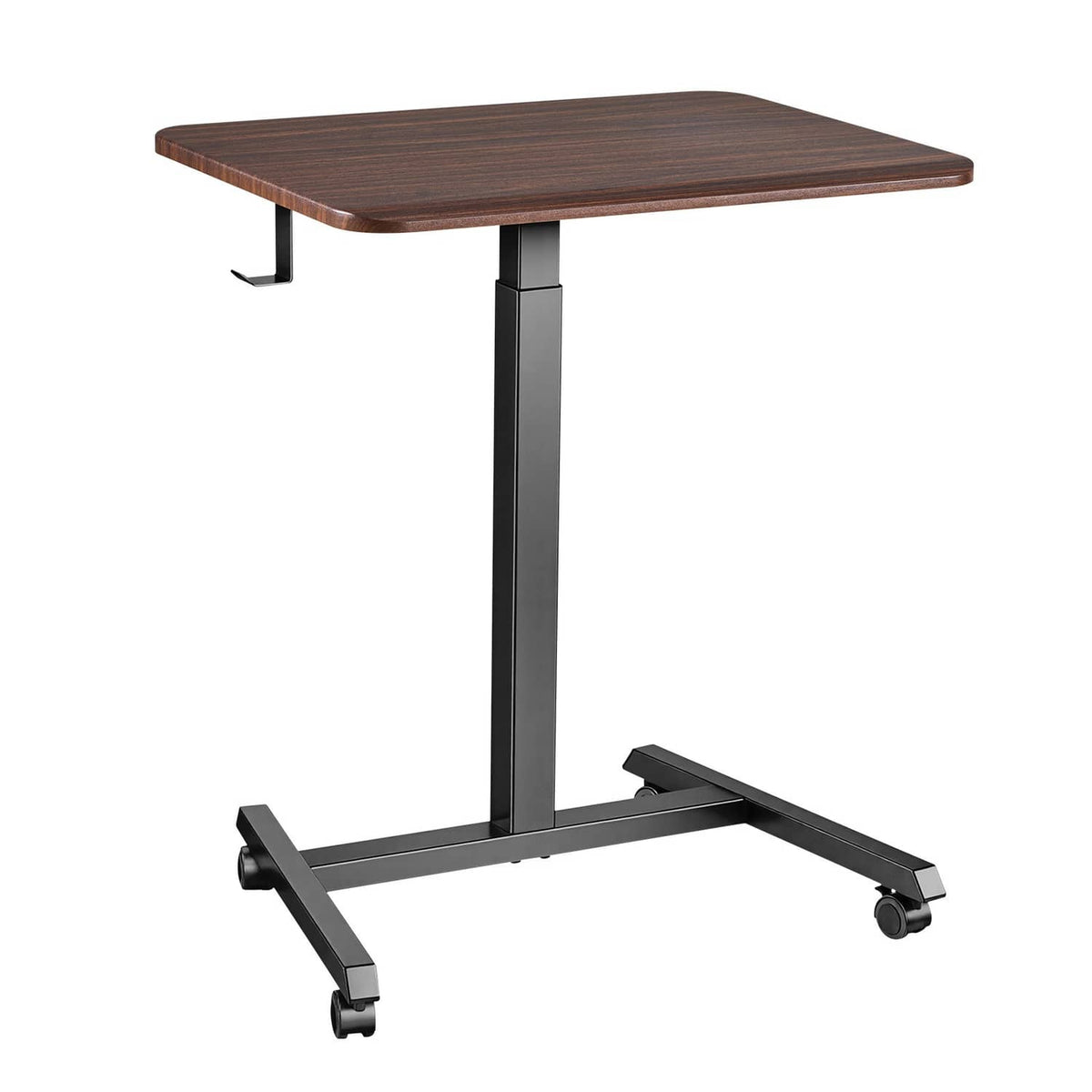 Standing desk with dark wood tabletop, tall metal column, and wheeled base