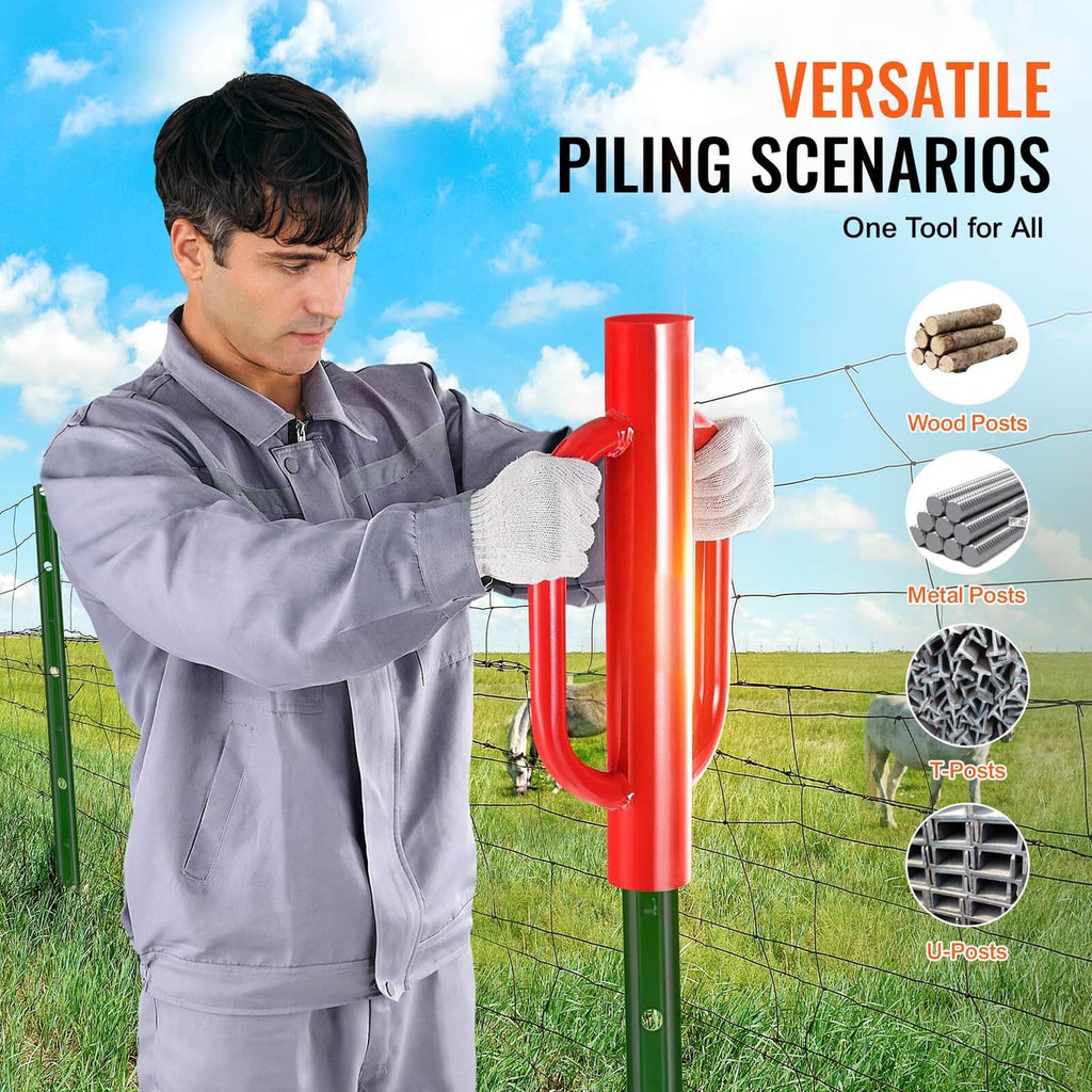Red steel piling tool held by a person, with tall shaft and loop handles