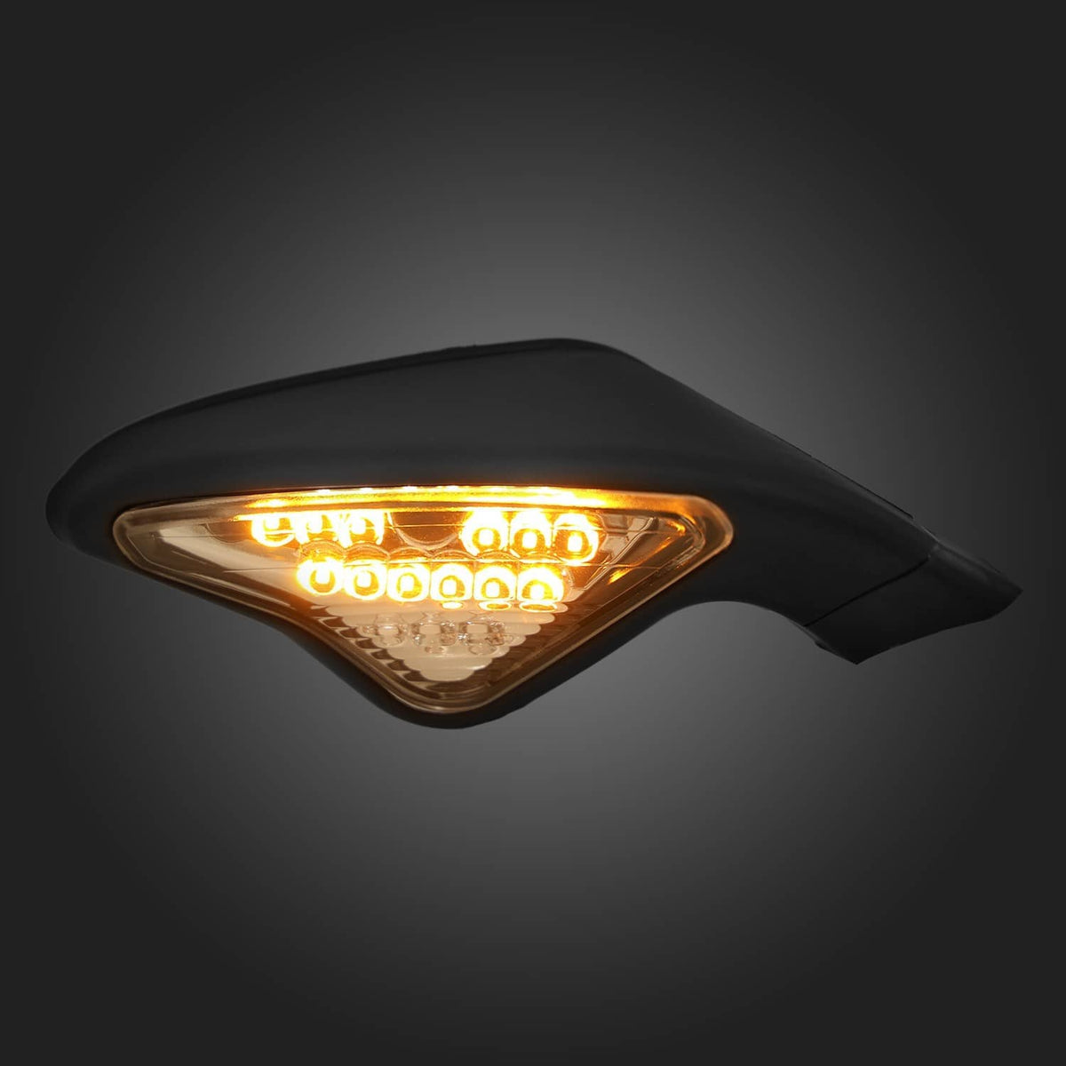 Rear-view mirror signal light with amber LED turn-signal glow in clear lens