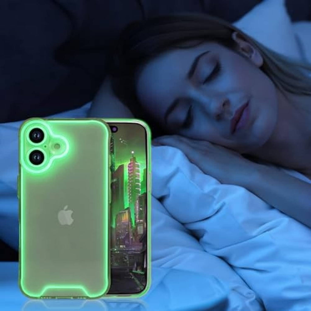 Green clear phone case with glowing outline resting beside a phone on a bed.