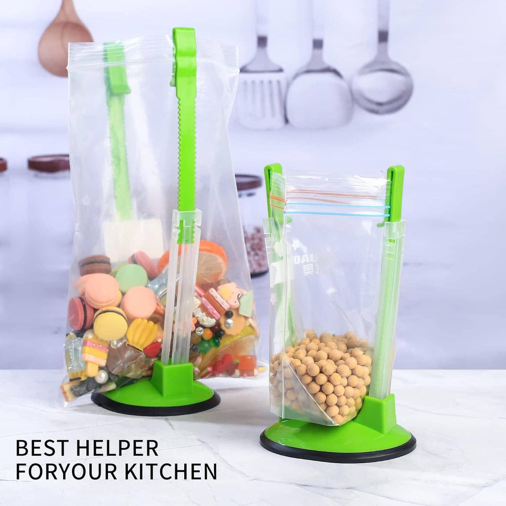 Adjustable freezer bag holder rack with green base and clear arms, holding bags