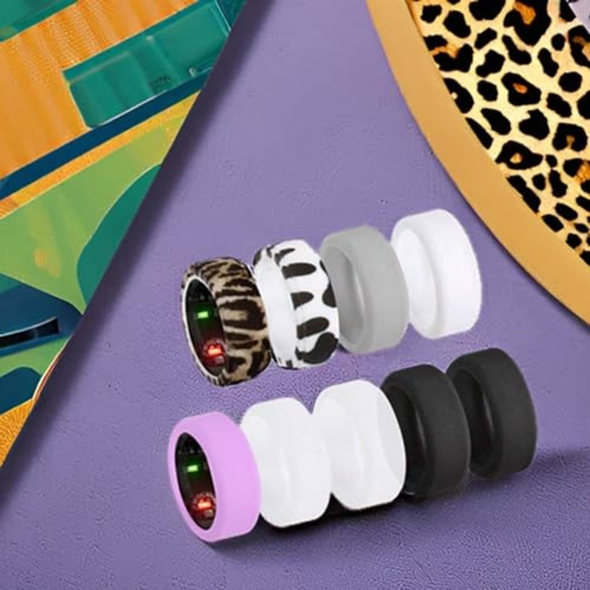 Ring cover set showing leopard, zebra, purple, white, and black sleeves