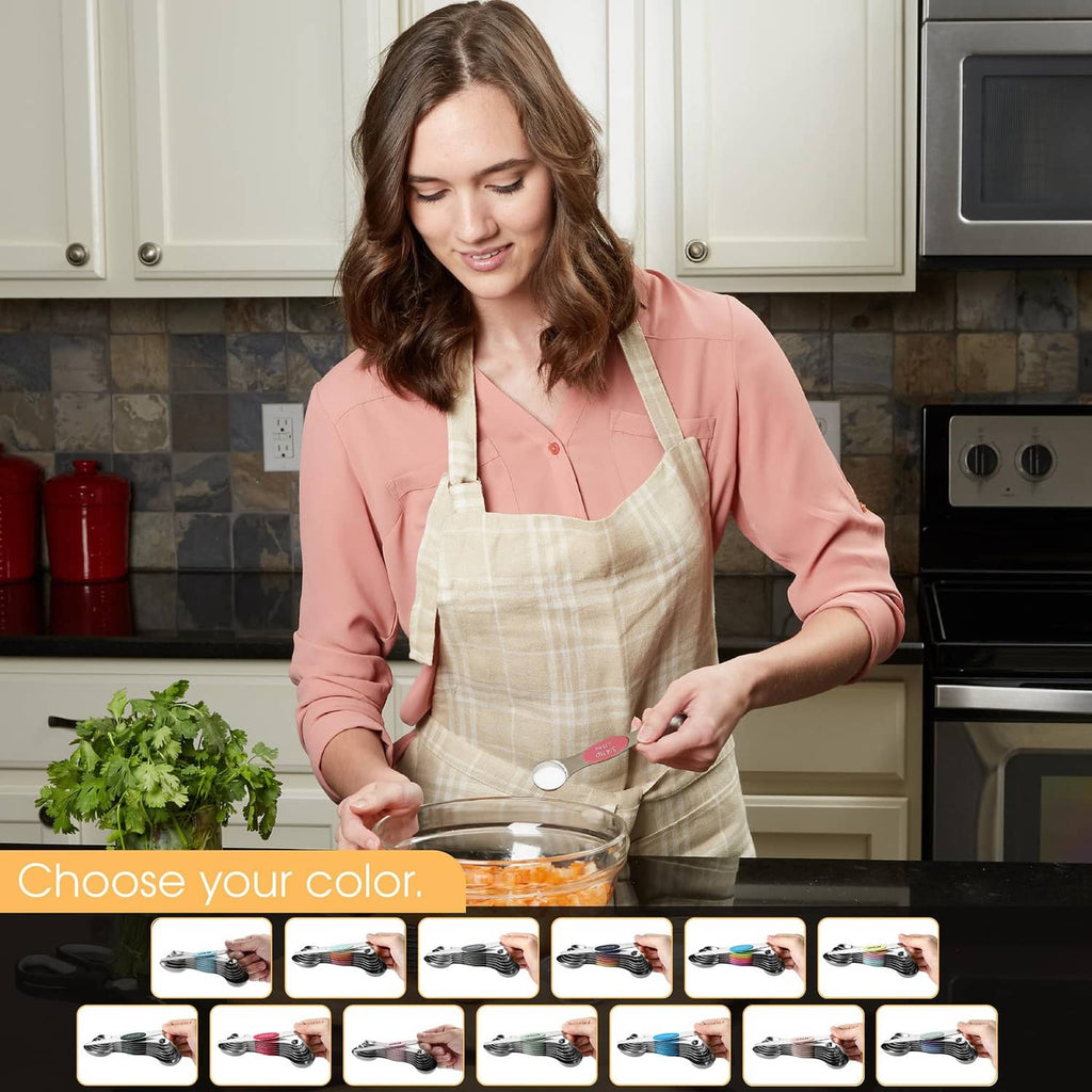 Stainless steel magnetic measuring spoon set with color-coded heads, shown in kitchen