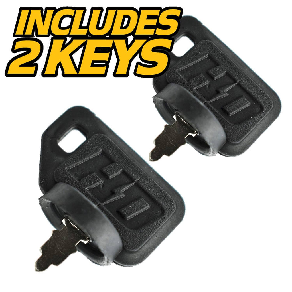 Pair of black ignition keys with dust-style covers and metal teeth