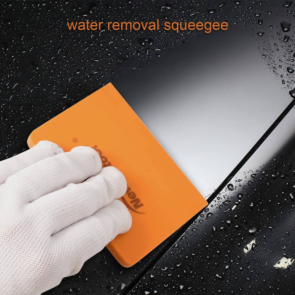 Orange silicone squeegee held by glove, V-blade edge for water removal, set of 2.