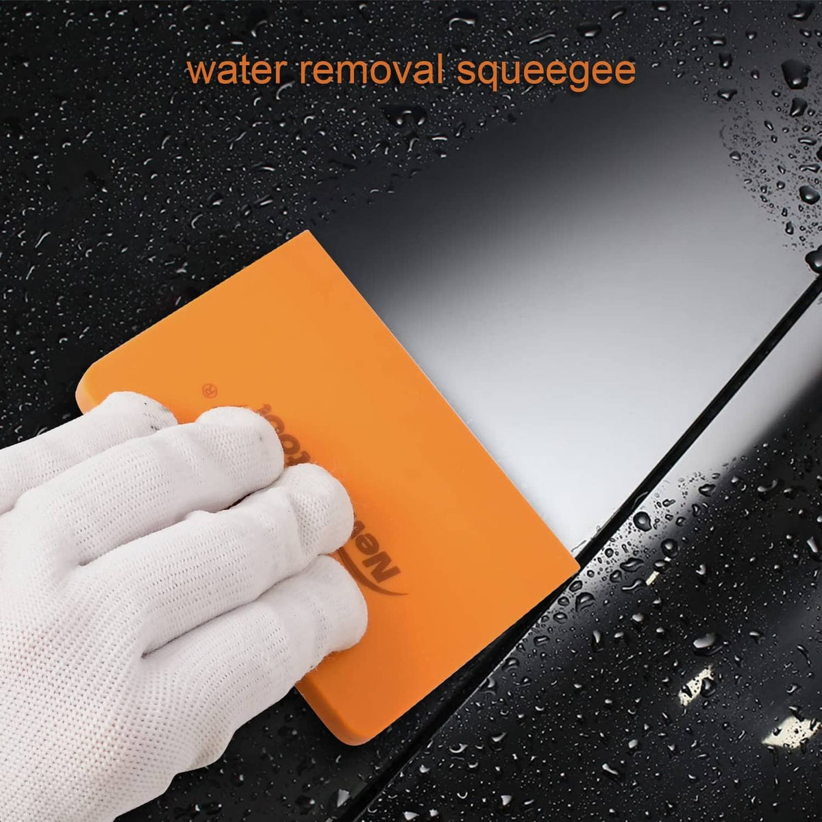 Orange silicone squeegee held by glove, V-blade edge for water removal, set of 2.