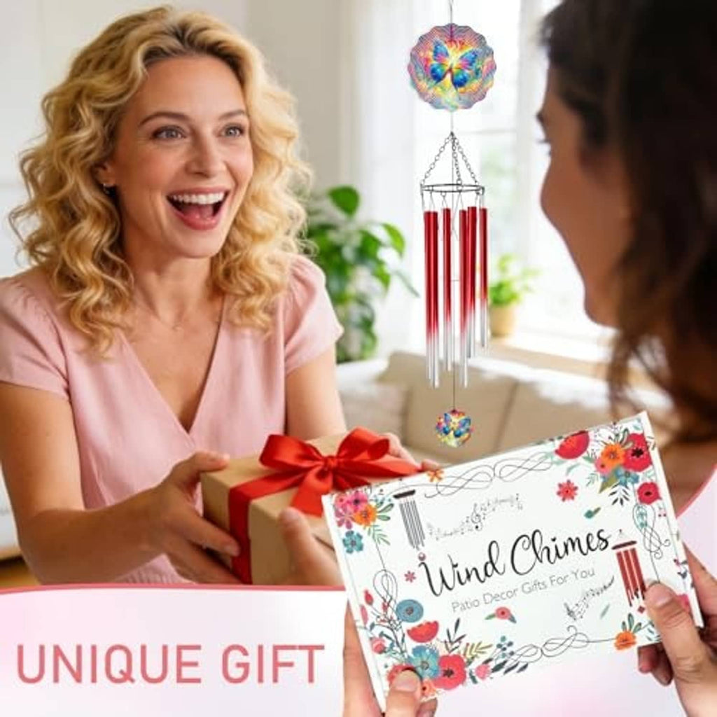 Butterfly wind chime gift box in hands with a hanging chime featuring red tubes